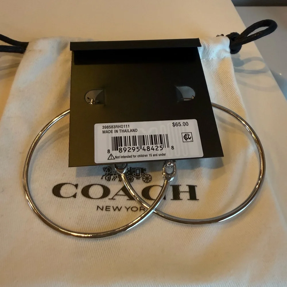 Coach Silver-Tone Large Hoop Earrings - Picture 2 of 2